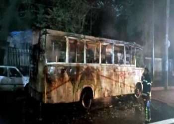থানার সামনে জব্দ করা বাসে আগুন