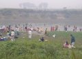 বংশাই নদীতে ডুবের মেলায় মানুষের ঢল