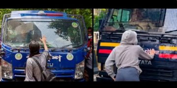 আন্দোলনে প্রিজন ভ্যানের সামনে দাঁড়িয়ে আলোচনায়